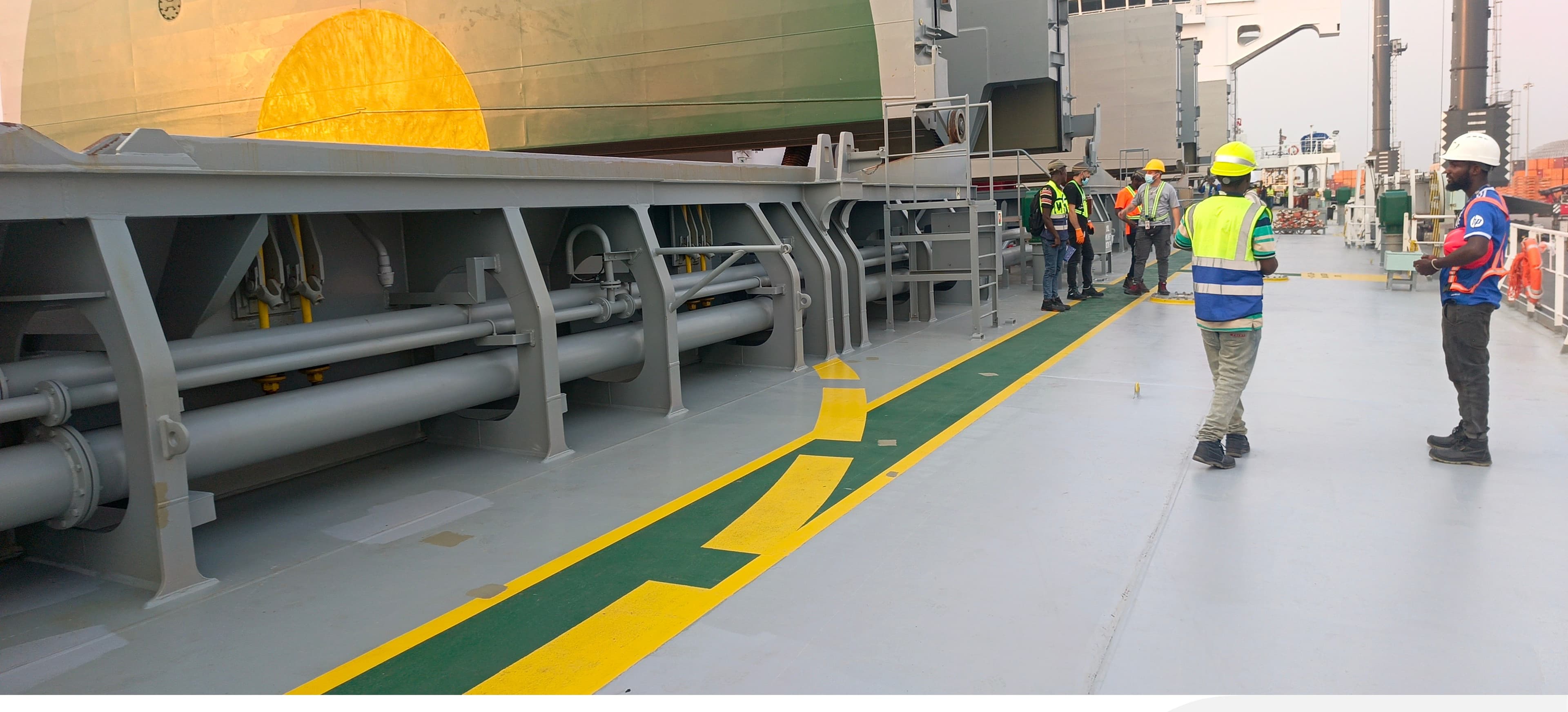 PGS surveyors conducting an on-deck inspection alongside vessel crew