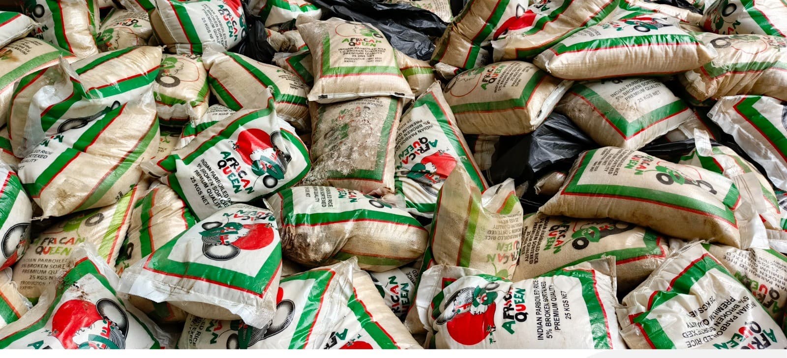 Damaged and wet rice bags identified during cargo inspection
